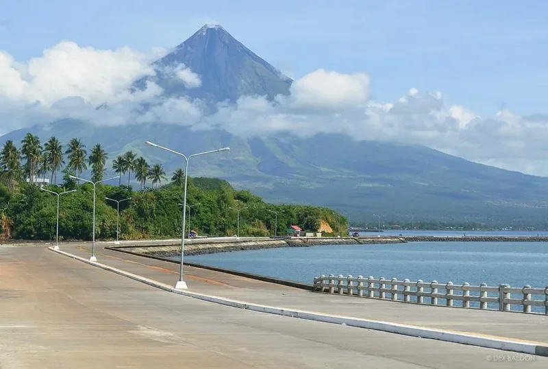 Legazpi Boulevard, a coastal promenade along Albay Gulf with Kapuntukan Hill beyond.